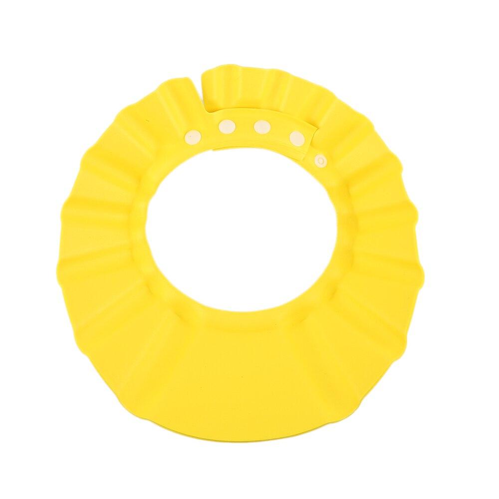 Multi-use baby haircut shield & shower cap protects eyes & ears, making bath & grooming tear-free.