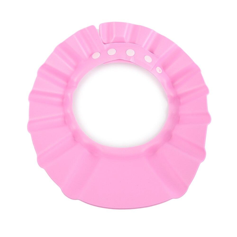 Tear-free baby bathing cap for a happy toddler bath, safeguarding sensitive eyes & ears from water.