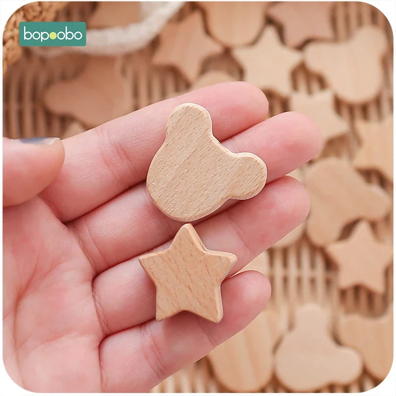 Variety pack of natural wood teething beads for babies, promoting safe teething relief