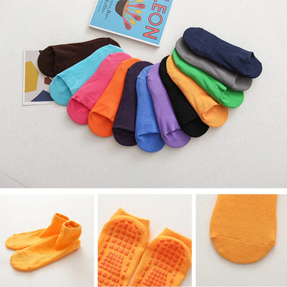 Family wearing unisex anti-slip trampoline socks, a 10-pair pack for adults and children
