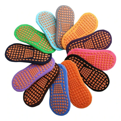 Adult-sized anti-slip trampoline sock in red, a durable cotton sports sock with strong grip