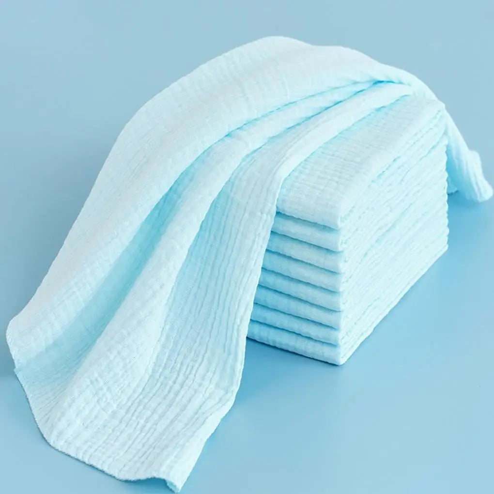 White cotton gauze baby diapers, showing their soft texture and durability