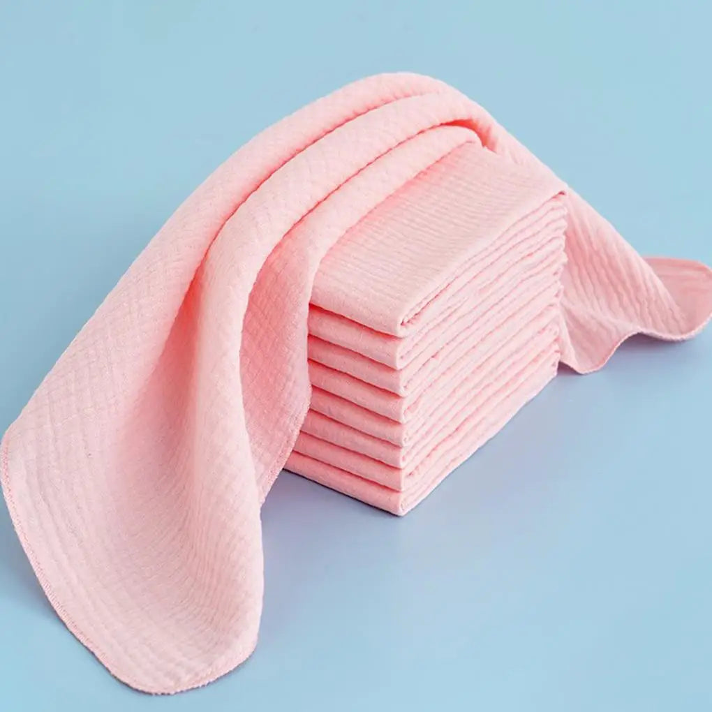 Array of ten washable cotton baby diapers, perfect for eco-conscious parents