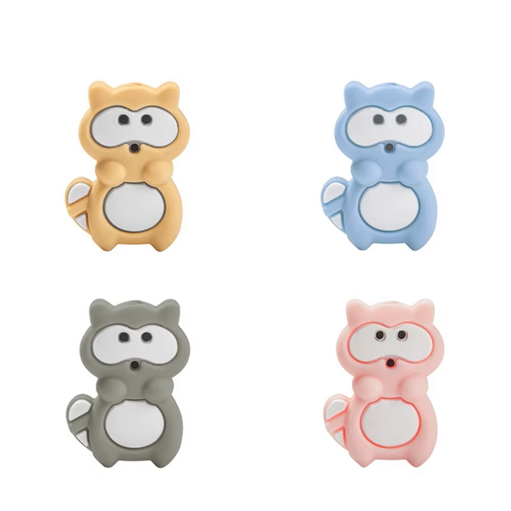 Colorful silicone teether beads on a white surface, ready for DIY pacifier clip creations.