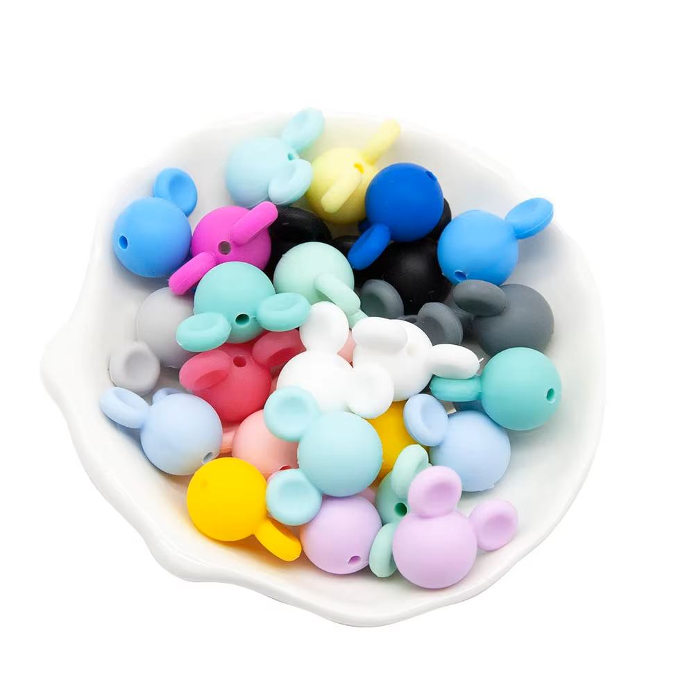 Baby-safe silicone teether beads, a set of 10, for making custom chewable accessories.