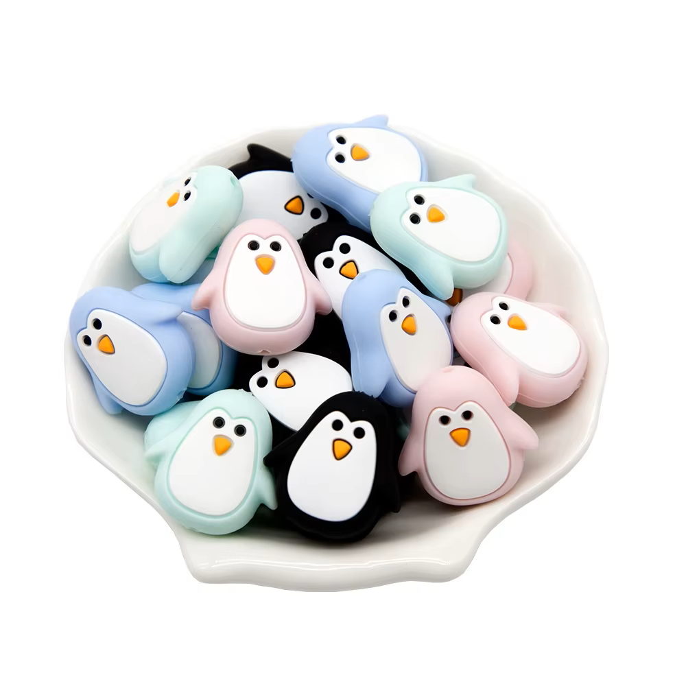 Smooth silicone beads for babies, ideal for DIY pacifier clips and sensory teething crafts.