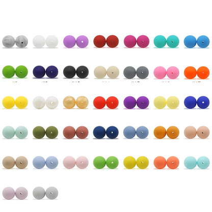 Ten vibrant silicone teether beads in a bowl, ready for DIY pacifier clips & chewable baby toys.