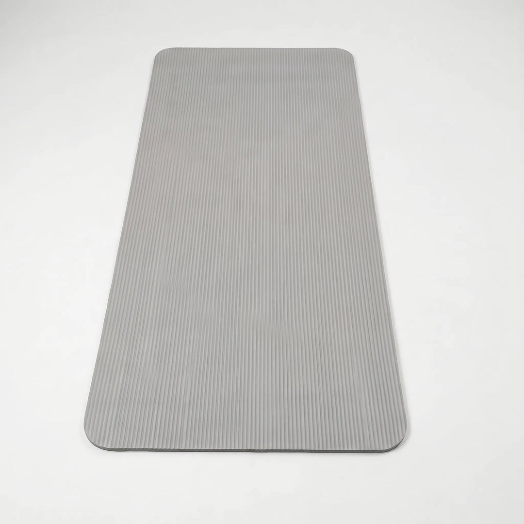 Non-slip, thick exercise mat for high-impact training, yoga & Pilates, providing excellent joint support.