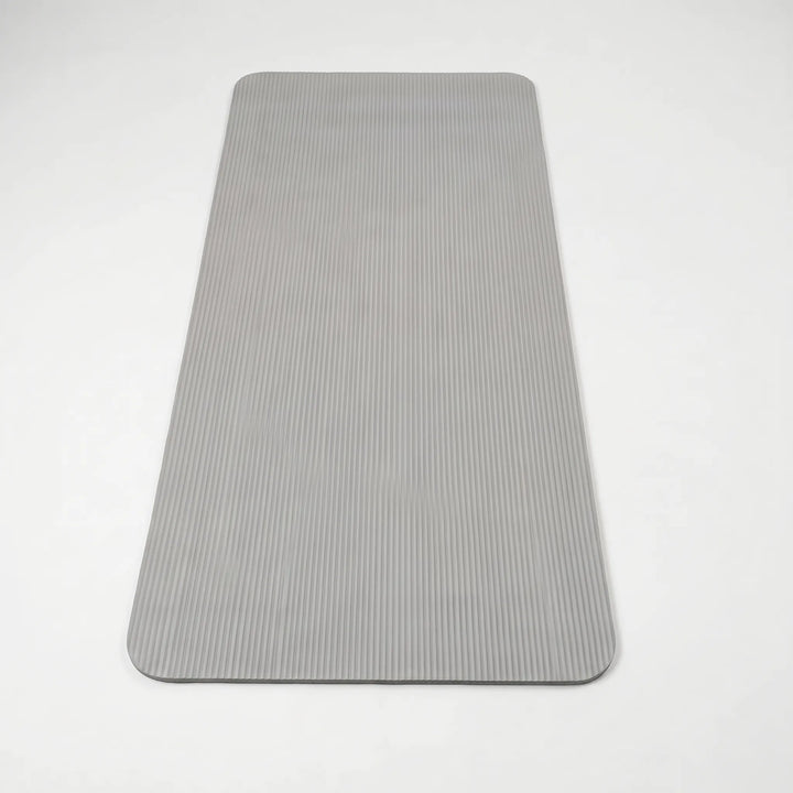 Non-slip, thick exercise mat for high-impact training, yoga & Pilates, providing excellent joint support.