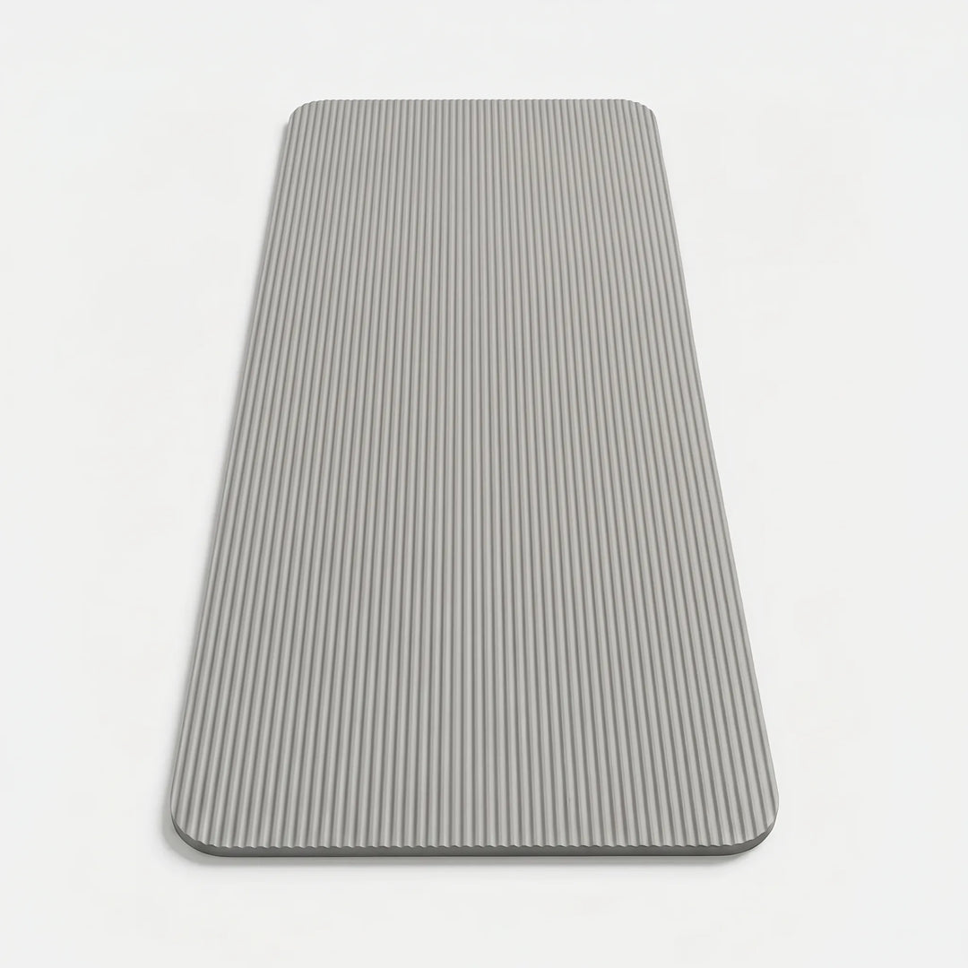 Close-up of a thick, textured fitness mat, designed for high-impact exercises and superior joint support.