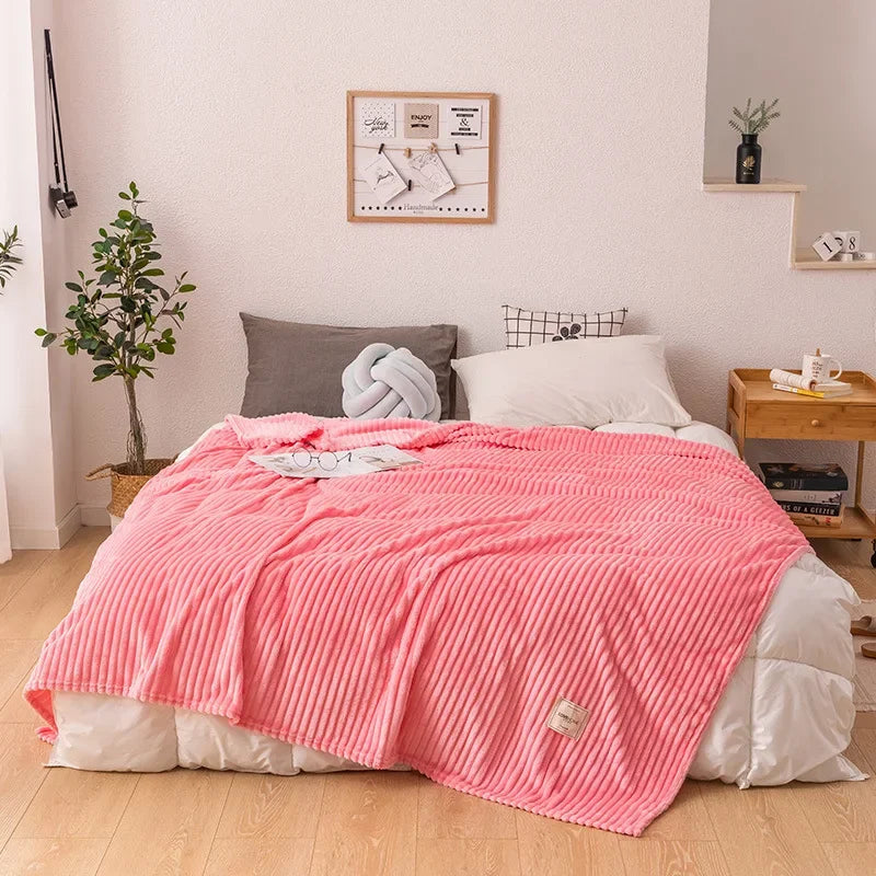 Soft, warm flannel blanket, neatly folded, ready for cozy autumn & winter nights.
