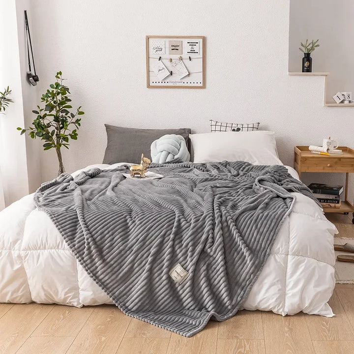 Luxurious thick flannel throw, a soft and warm textile for cozy autumn home decor.