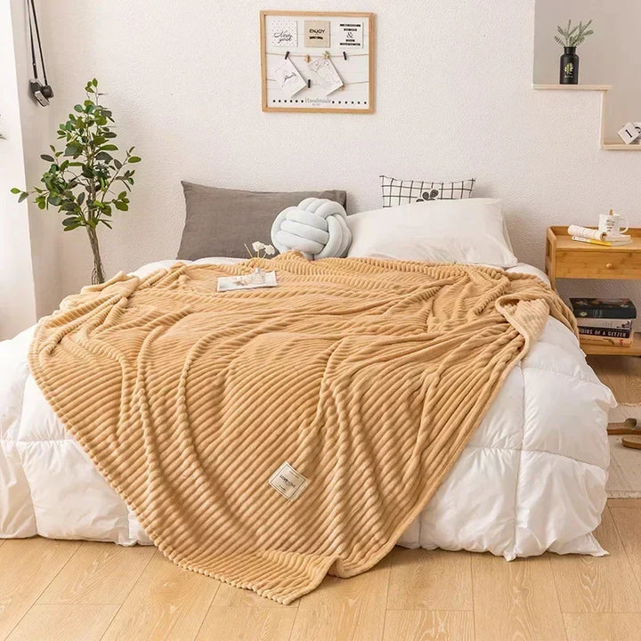 Unisex cozy flannel blanket, a versatile & plush throw for autumn comfort & bedding.