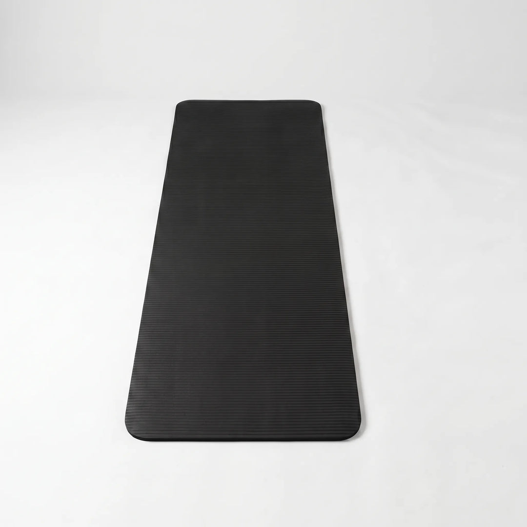 Non-slip, thick fitness mat, ideal for home gym workouts, yoga, and stretching.