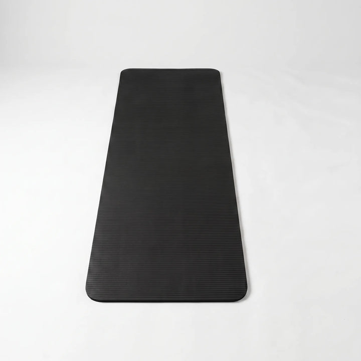 Non-slip, thick fitness mat, ideal for home gym workouts, yoga, and stretching.