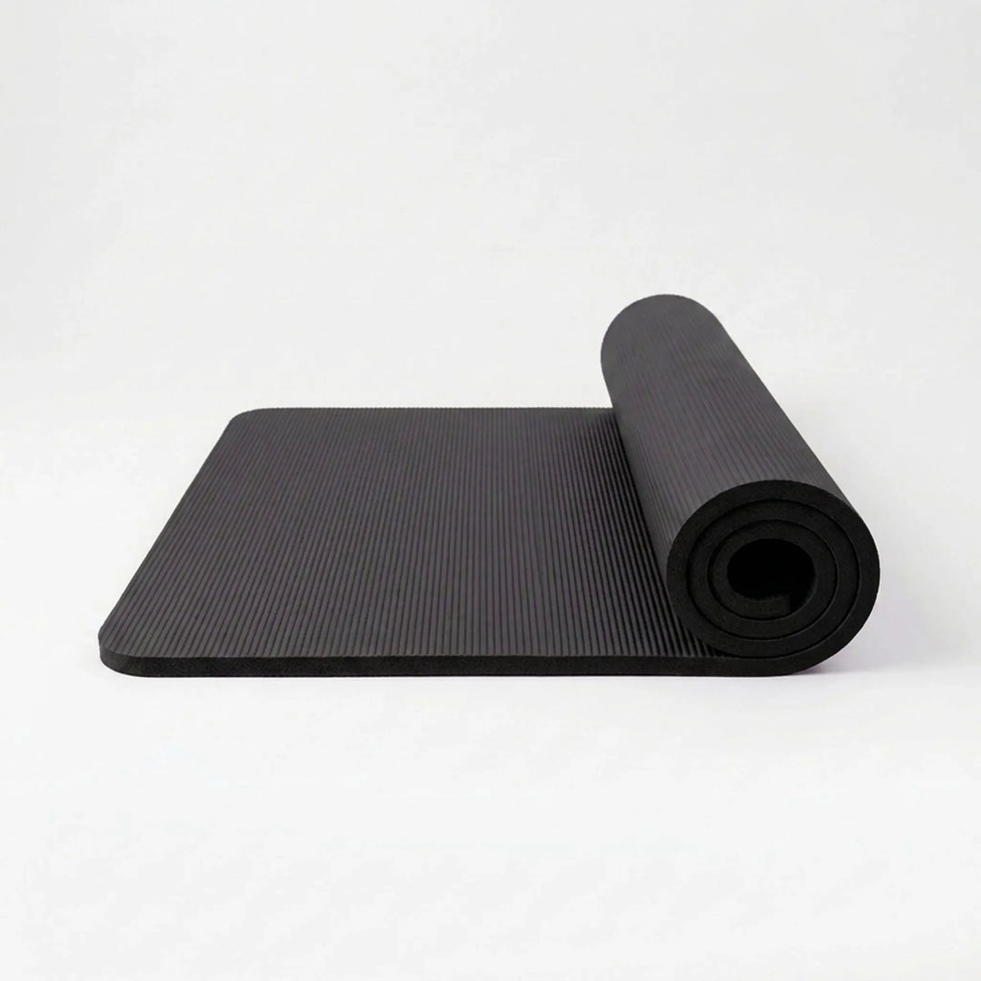Cushioned, thick yoga mat for comfortable pilates, stretching, and general exercise.