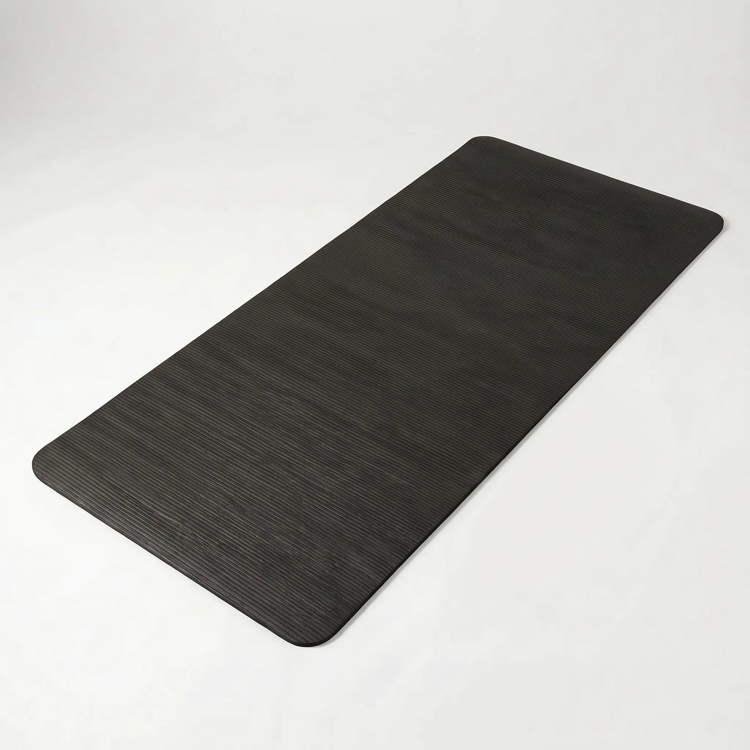 Thick, non-slip fitness mat ensures safe, cushioned workouts for your home gym.