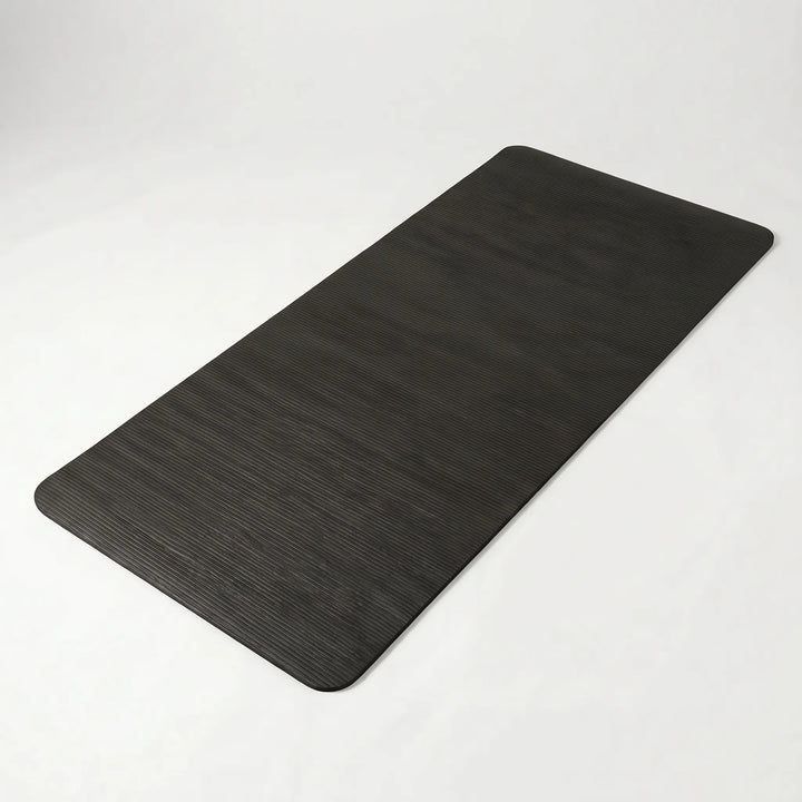 Thick, non-slip fitness mat ensures safe, cushioned workouts for your home gym.