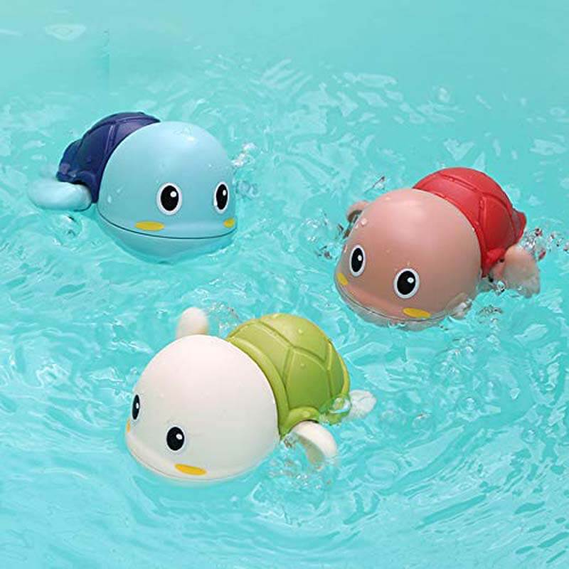 Set of three non-toxic baby bath toys; vibrant swimming turtles, ideal for toddler water fun.