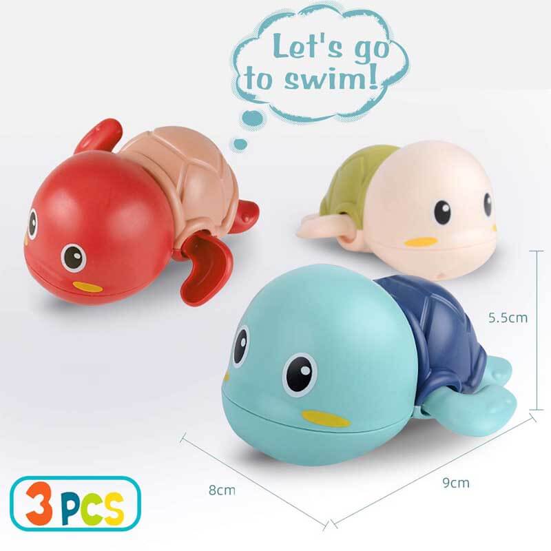 Smiling baby playing with a colorful swimming turtle bath toy, ideal for safe toddler water fun.