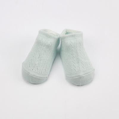 Stack of three pairs of breathable baby anti-slip mesh cotton socks, perfect for toddlers
