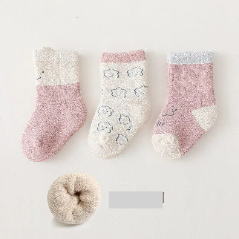 Close-up of the heel and toe of a thick baby sock, showing quality and warmth, toddler footwear
