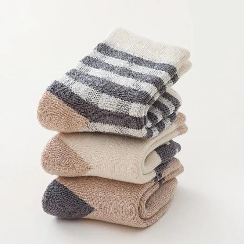 Package containing three pairs of essential warm baby socks, ideal for autumn-winter wear