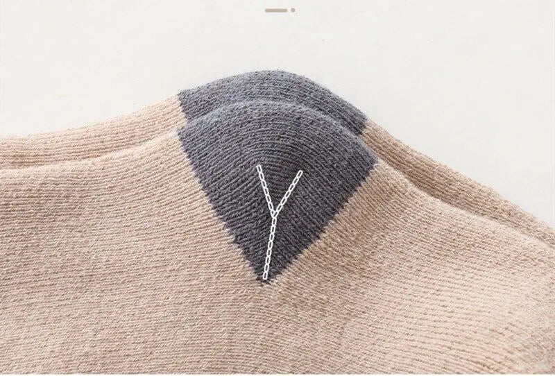 Essential autumn-winter baby socks, providing cozy warmth and soft comfort for little feet
