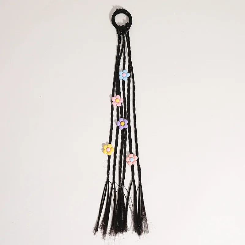 Heart and flower themed hair beads on an elastic hair tie, a charming children's accessory