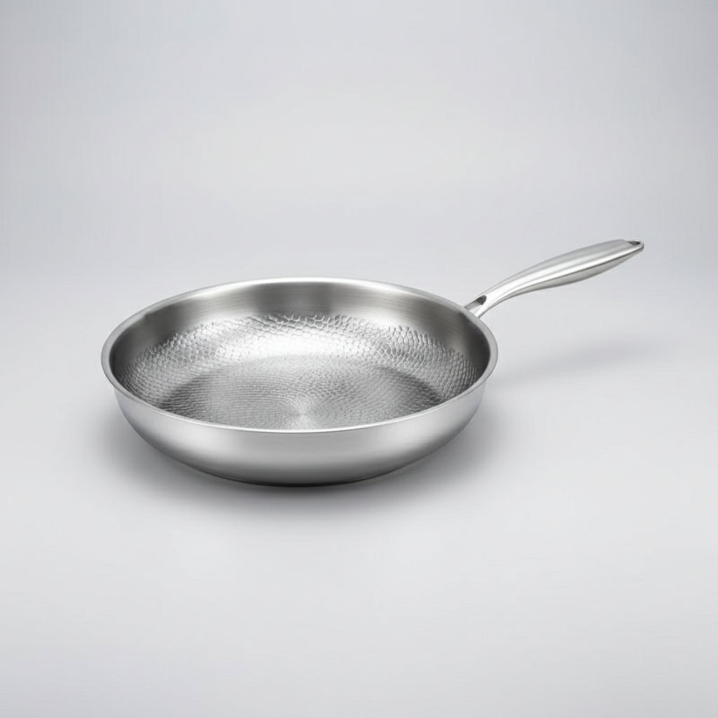 High-performance non-stick frying pan, hammered titanium design, induction compatible for everyday cooking.