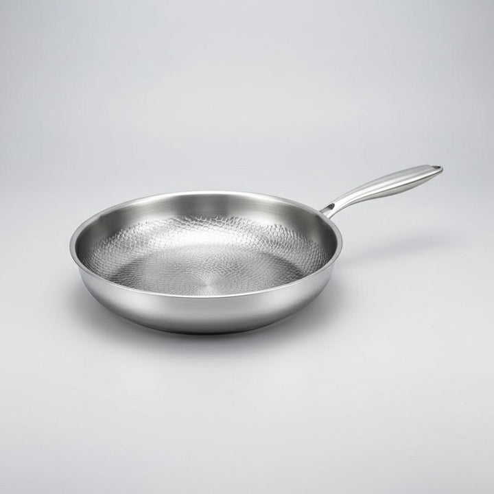 High-performance non-stick frying pan, hammered titanium design, induction compatible for everyday cooking.