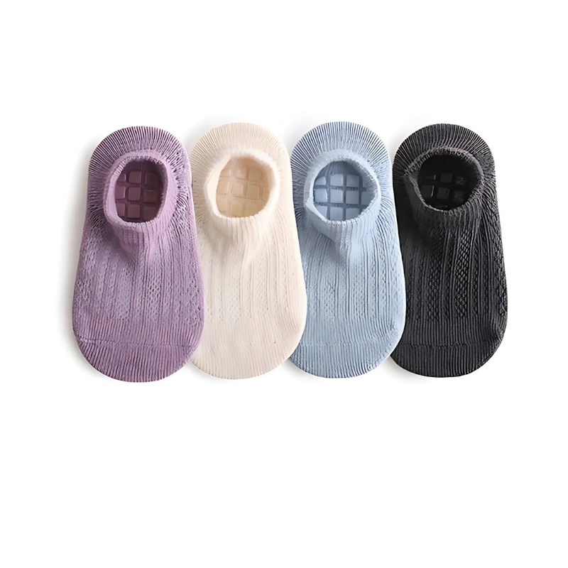 Set of comfortable breathable toddler anti-slip ankle socks in various colors for baby's first steps