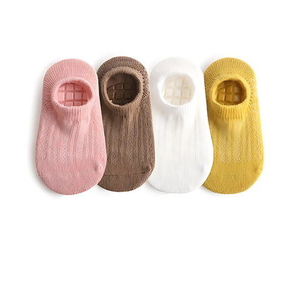 Soft cotton anti-slip ankle socks for toddlers, designed for comfort and grip during learning to walk