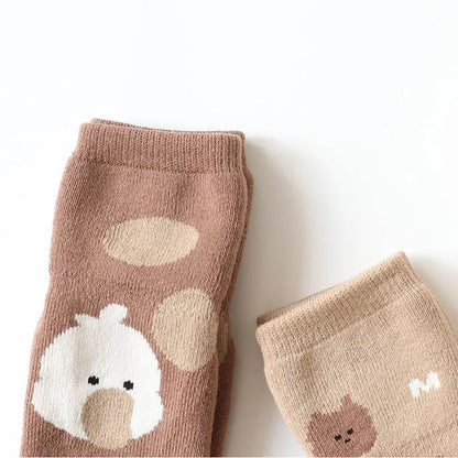 Soft toddler non-slip cartoon sheep socks, cozy winter baby footwear, unisex design.