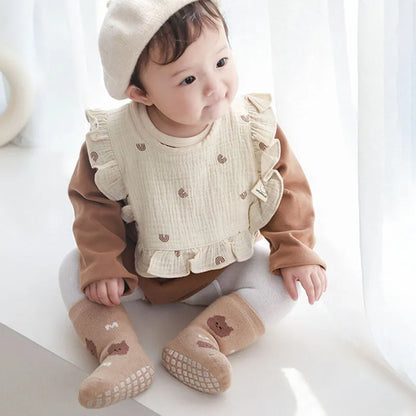 Winter baby anti-slip cartoon rocket socks, warm and secure footwear for little explorers.