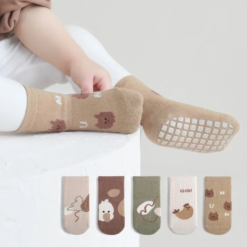 Winter baby anti-slip cartoon car socks, cozy and safe footwear for active toddlers.