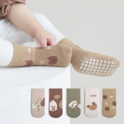 Winter baby anti-slip cartoon car socks, cozy and safe footwear for active toddlers.