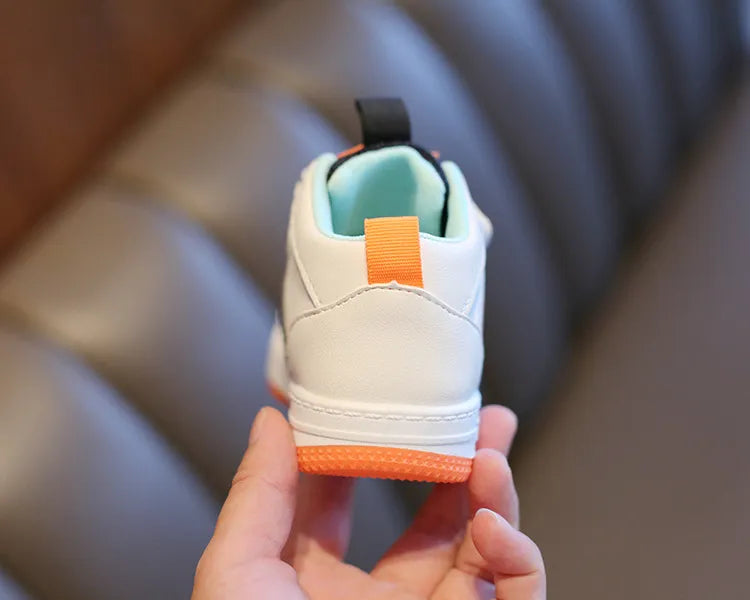 Breathable fabric detail on kids' anti-slip shoes, ensuring comfort during active play