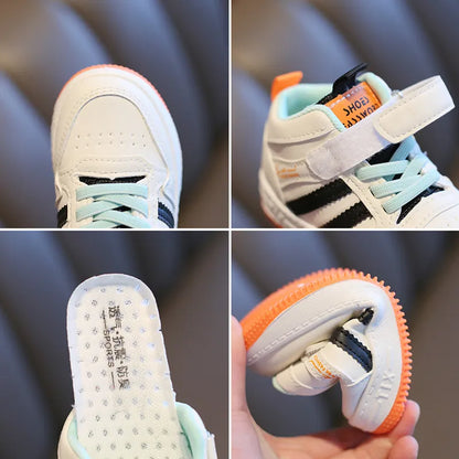 Durable anti-slip kids shoes, black & white, providing secure footing for active toddlers