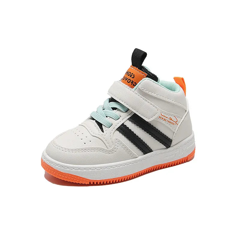Child running outdoors in anti-slip toddler trainers, demonstrating flexibility & comfort