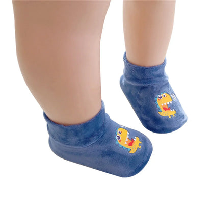 Light grey baby footwear, anti-slip gripper sock shoes, keeping tiny feet warm and secure.