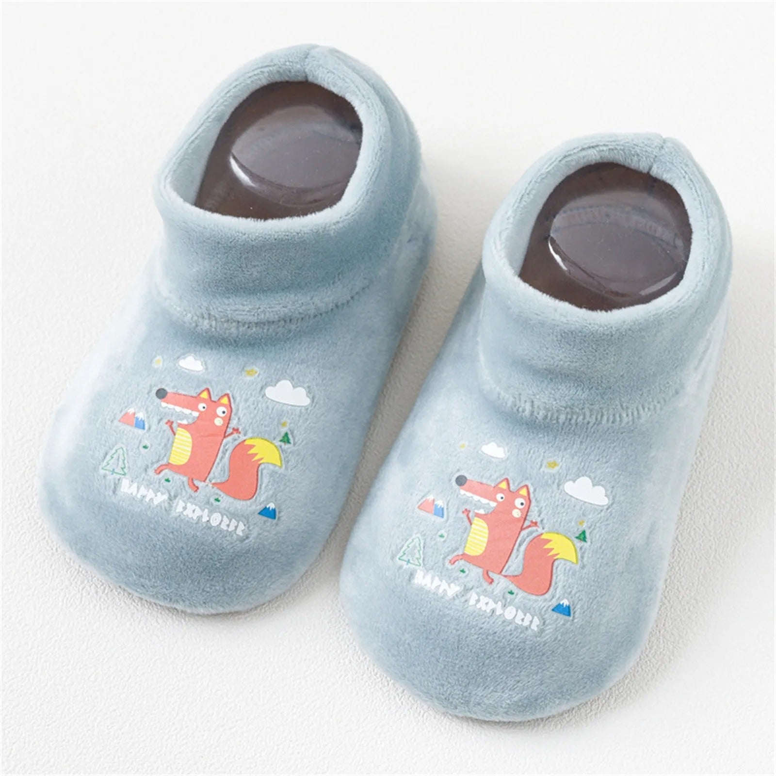 Close-up of the anti-slip sole on green toddler gripper sock shoes, ensuring steady movement for infants.
