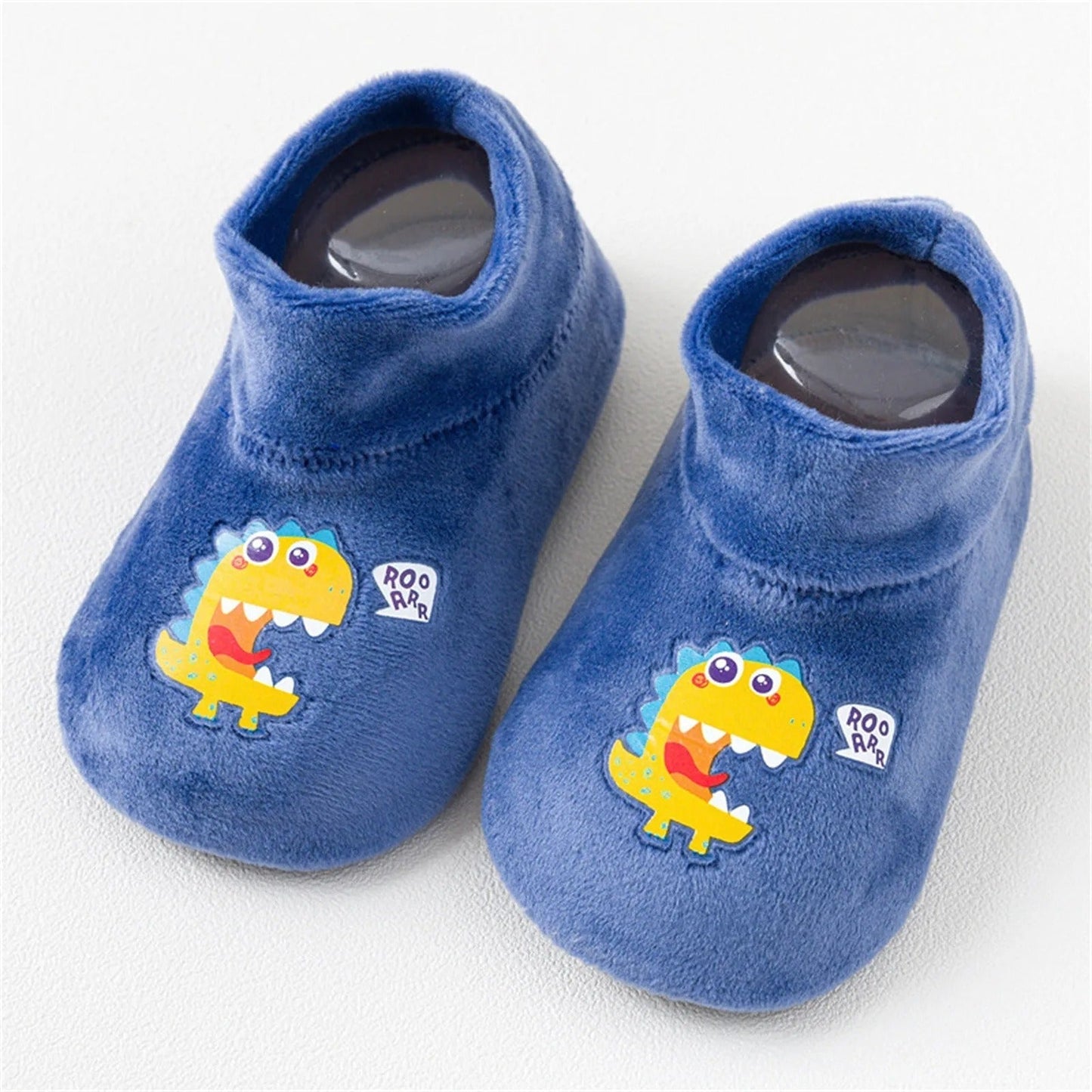 Red toddler sock shoes with a flexible soft sole and robust anti-slip dots for beginning walkers.