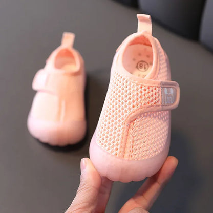 Childrens fashion: a blue breathable mesh summer shoe, anti-slip design for young toddlers.