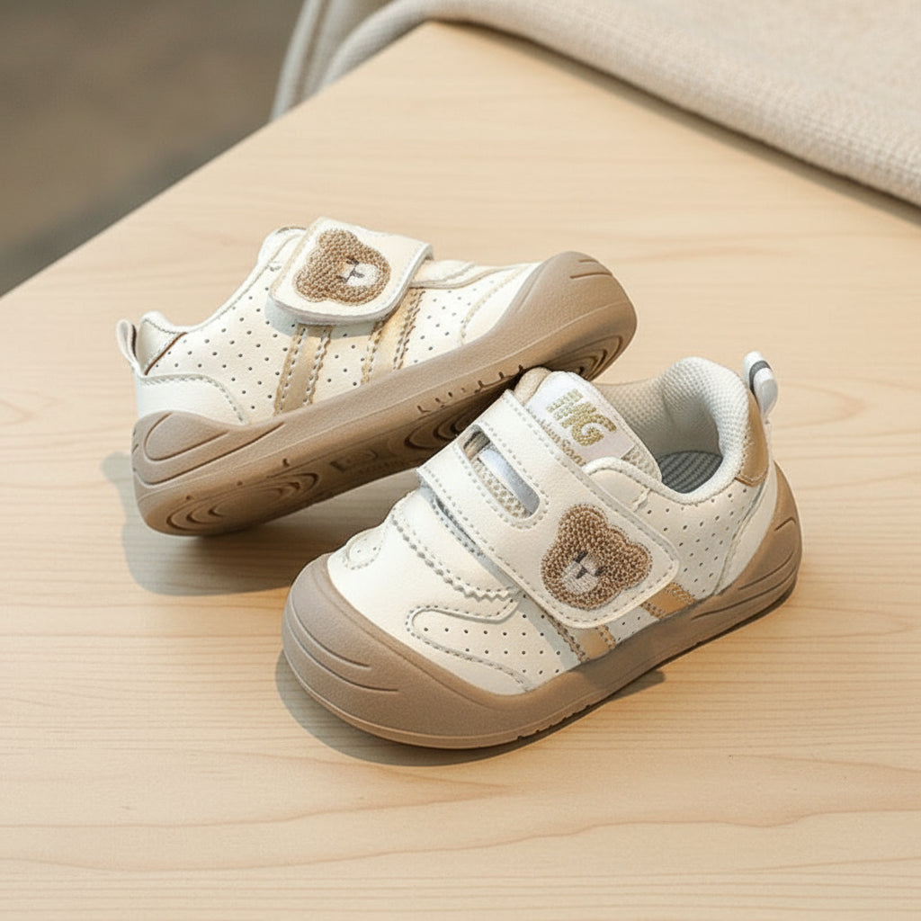Angled shot of flexible sole bear Velcro sneakers, perfect play shoes for toddlers