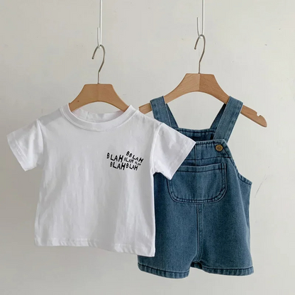 Toddler boy in blue cotton blend overalls with a white tee, perfect for summer playwear.