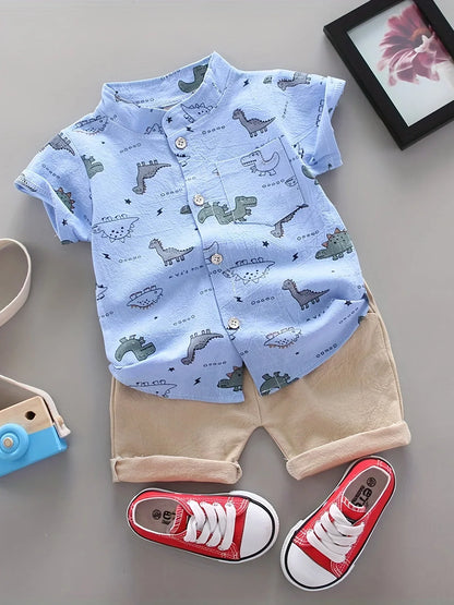 Toddler boy in blue dinosaur t-shirt & matching shorts, perfect summer play outfit for kids