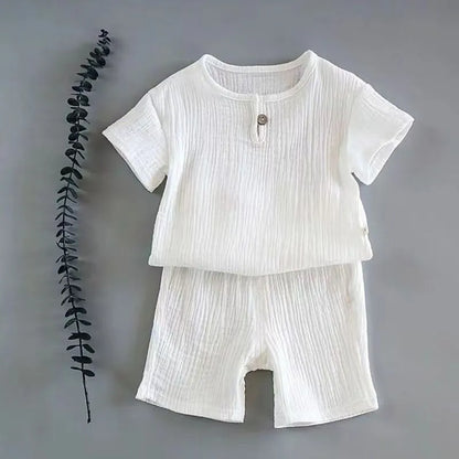 Full shot of a 1-6 years boy's linen cotton t-shirt and shorts set in natural beige