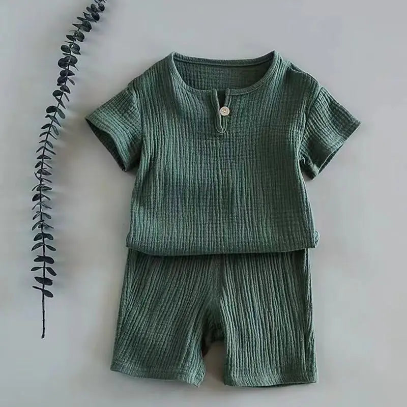 Childrens apparel: yellow linen cotton t-shirt and shorts set, perfect for warm weather
