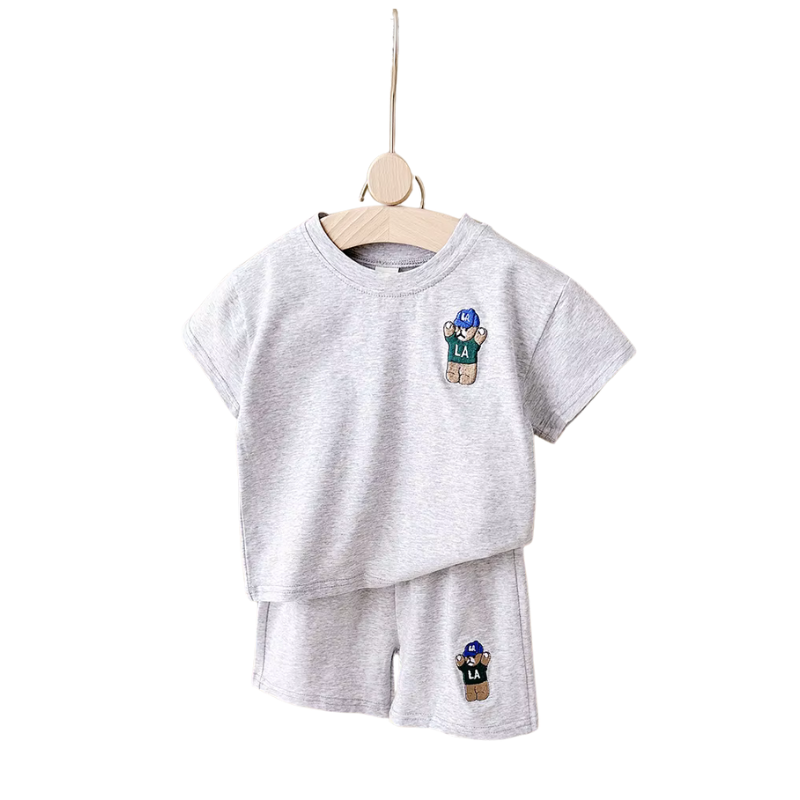 Urban bear print toddler boy's summer outfit set, showing a lightweight t-shirt and matching shorts for kids fashion.